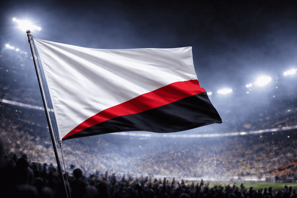 Drapeau personnalisé grand format en tribune de stade, couleurs vives et finition professionnelle.